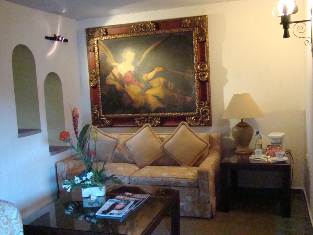 Posezení v ubytování Mansion del Cupatitzio