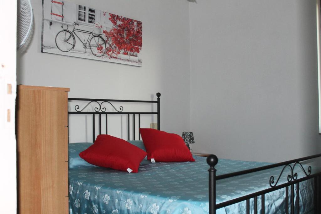 A bed or beds in a room at Affittacamere Piagge