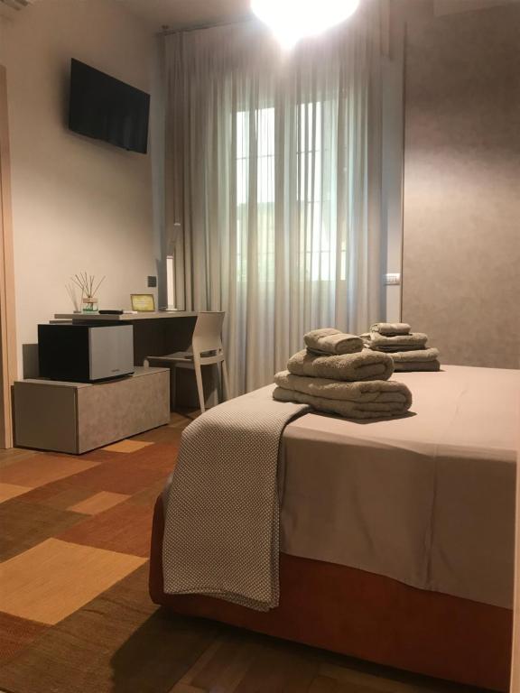 Postel nebo postele na pokoji v ubytování via roma 12 VERONA