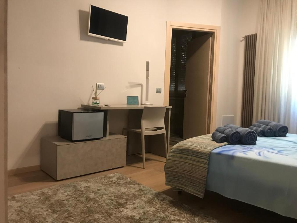 Postel nebo postele na pokoji v ubytování via roma 12 VERONA
