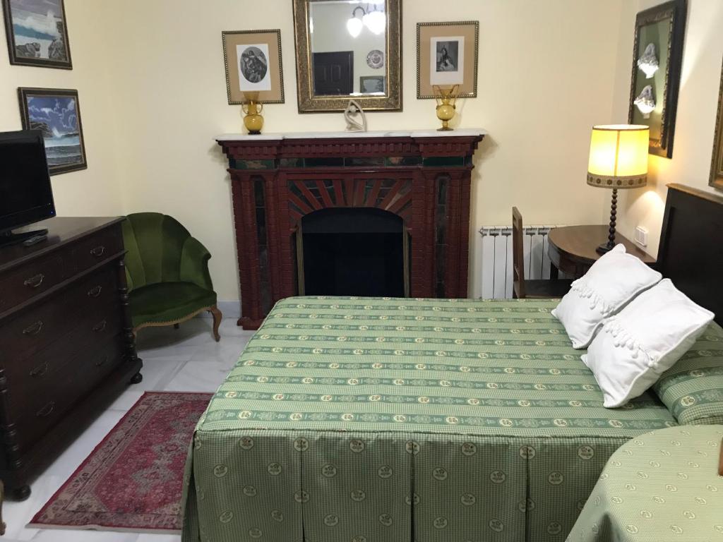 Postel nebo postele na pokoji v ubytování Casa San José