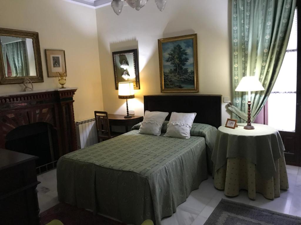 Postel nebo postele na pokoji v ubytování Casa San José