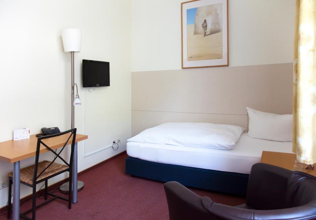 Postel nebo postele na pokoji v ubytování Hotel Weidenhof