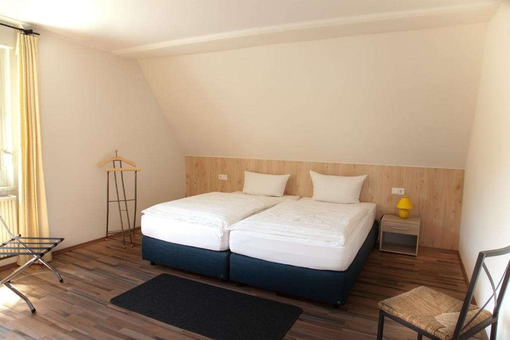 Postel nebo postele na pokoji v ubytování Hotel Weidenhof