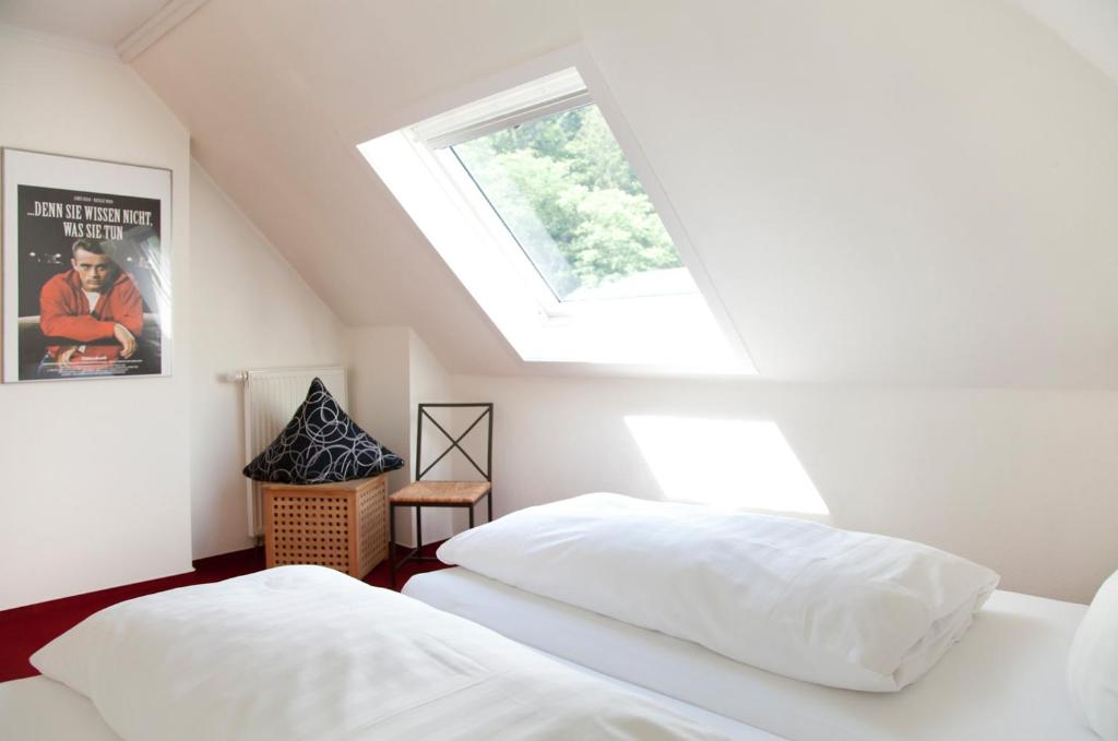 Postel nebo postele na pokoji v ubytování Hotel Weidenhof