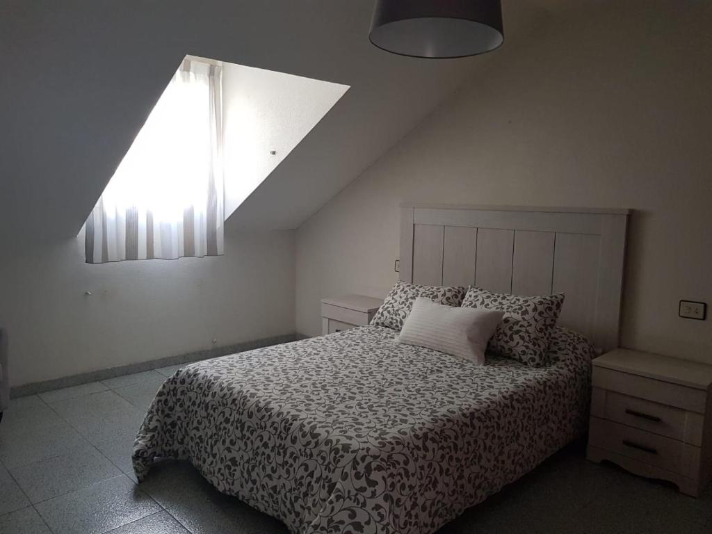 Posteľ alebo postele v izbe v ubytovaní Apartamento Telefónica Trece