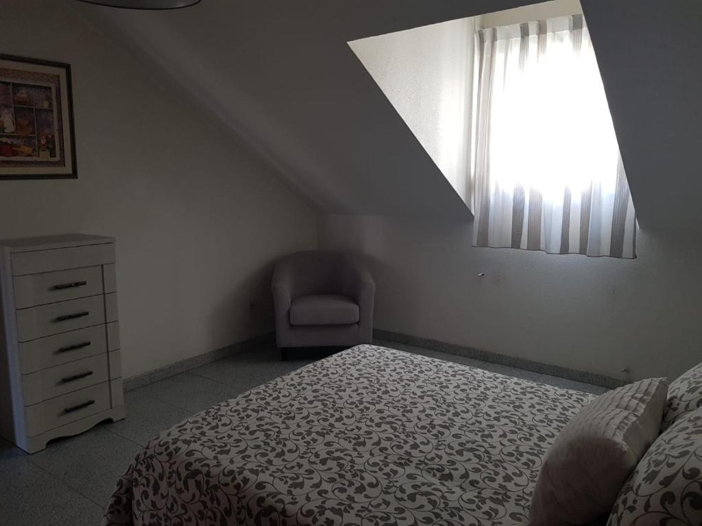 Posteľ alebo postele v izbe v ubytovaní Apartamento Telefónica Trece