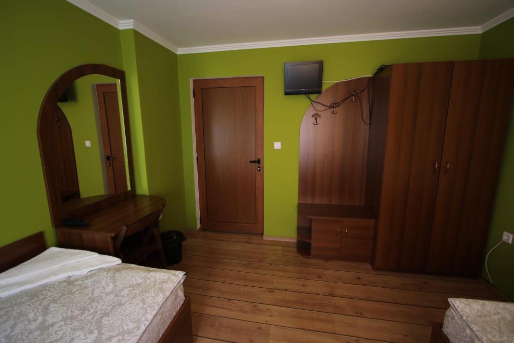 Postel nebo postele na pokoji v ubytování Къща за гости Джая
