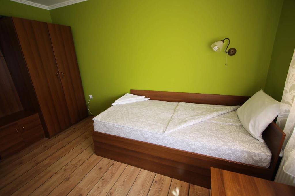 Postel nebo postele na pokoji v ubytování Къща за гости Джая