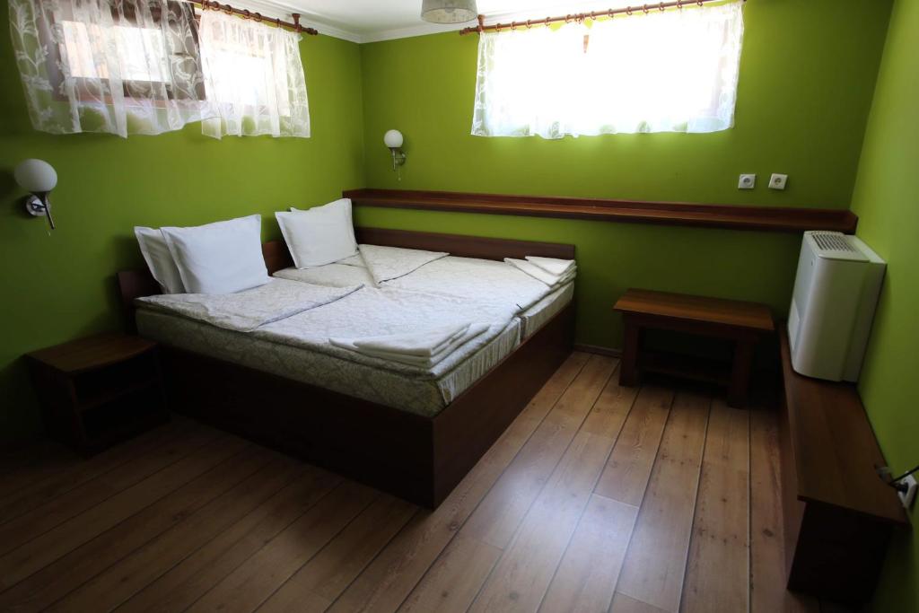 Postel nebo postele na pokoji v ubytování Къща за гости Джая