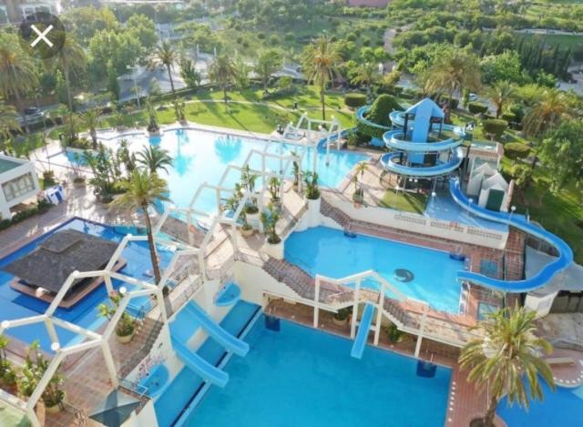 an aerial view of a pool at a resort at Benalbeach JR Suite in Málaga