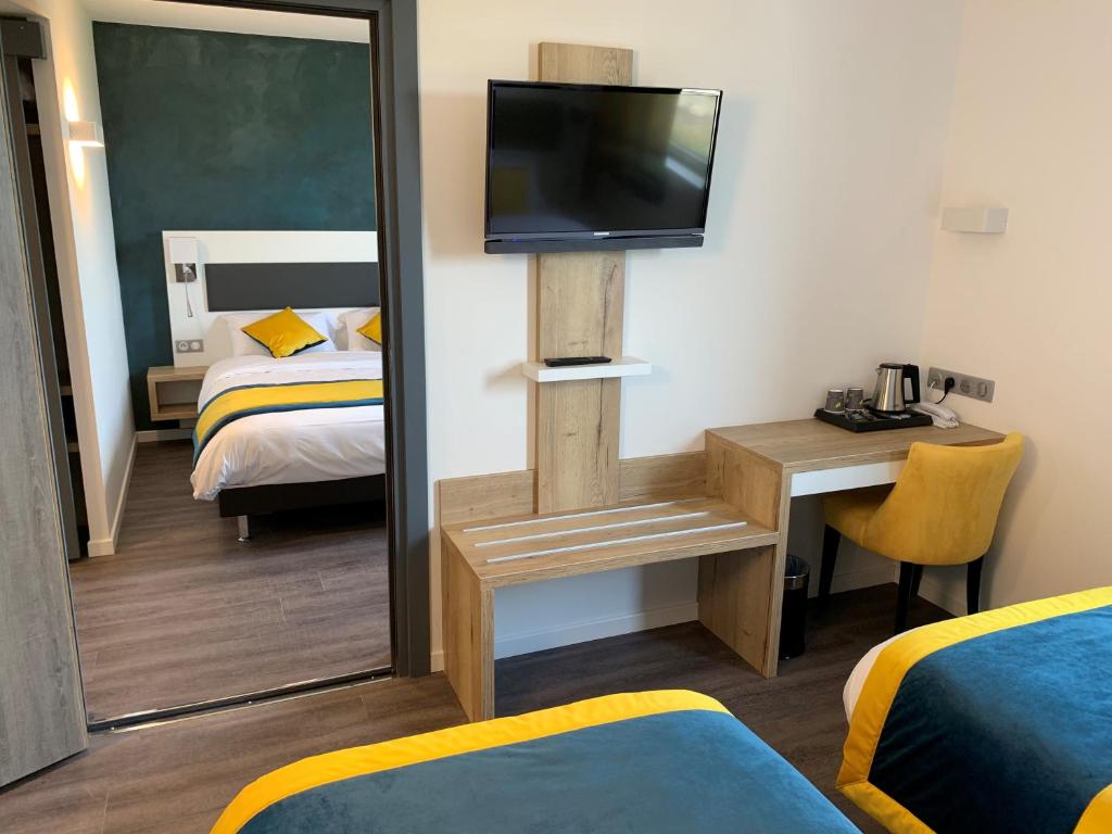 Postel nebo postele na pokoji v ubytování ATOLON PARK HOTEL