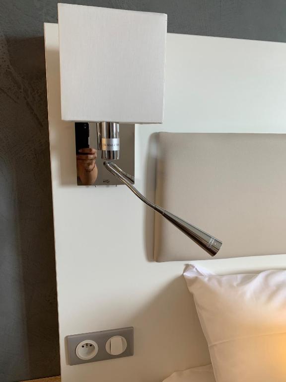 Postel nebo postele na pokoji v ubytování ATOLON PARK HOTEL