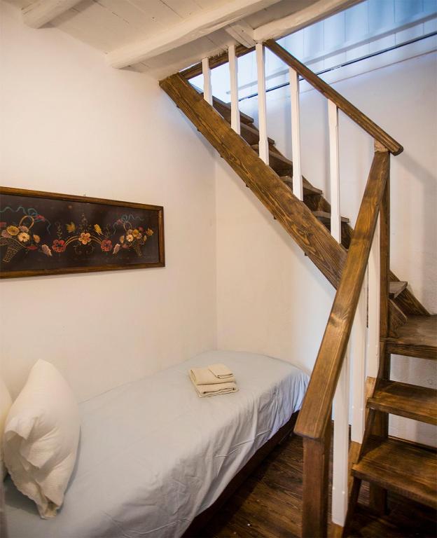 Postel nebo postele na pokoji v ubytování Rodia House
