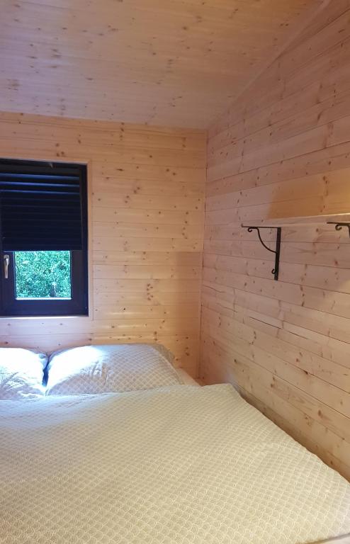 Postel nebo postele na pokoji v ubytování Chata Lužná