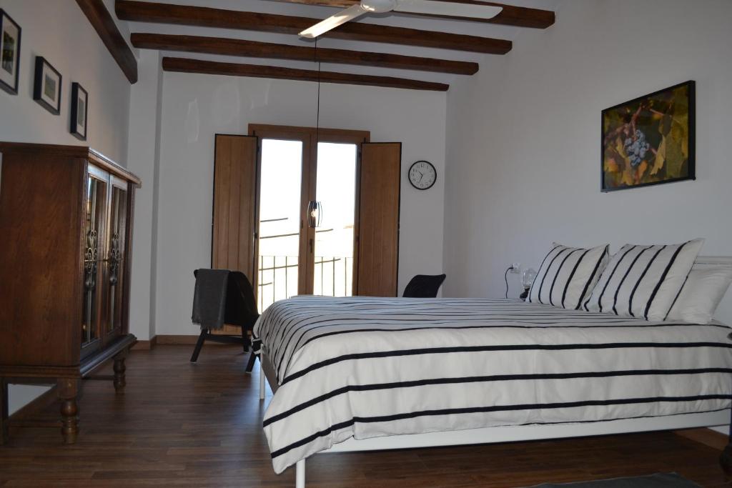Postel nebo postele na pokoji v ubytování Cal Campana