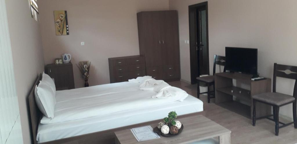 TV a/nebo společenská místnost v ubytování Guest House Ideal