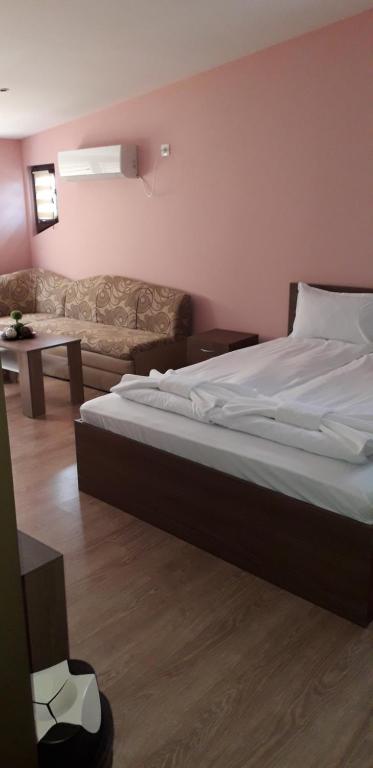 Postel nebo postele na pokoji v ubytování Guest House Ideal