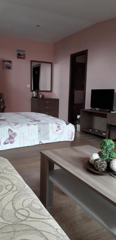 Postel nebo postele na pokoji v ubytování Guest House Ideal