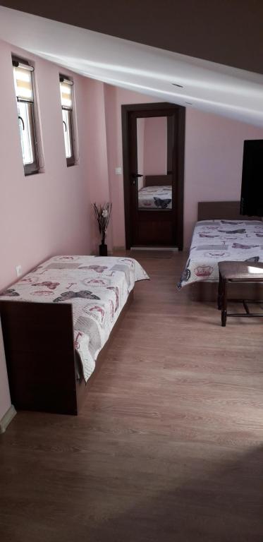 Postel nebo postele na pokoji v ubytování Guest House Ideal
