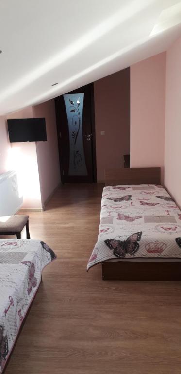 Postel nebo postele na pokoji v ubytování Guest House Ideal