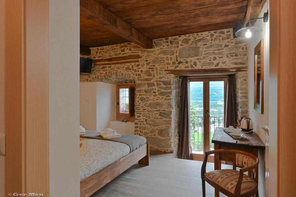 Postel nebo postele na pokoji v ubytování Ossola dal Monte - Affittacamere