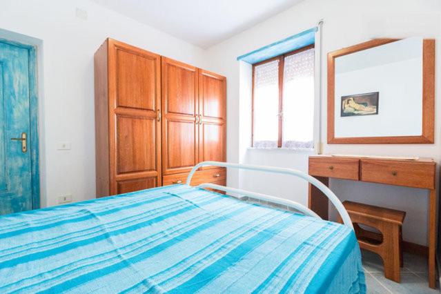A bed or beds in a room at On The Beach La Rena Beddha