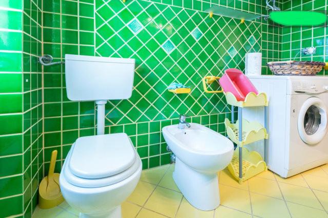 A bathroom at On The Beach La Rena Beddha