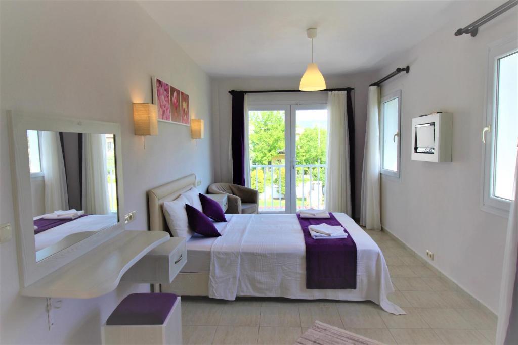 Postel nebo postele na pokoji v ubytování Dalyan Villa Amazon