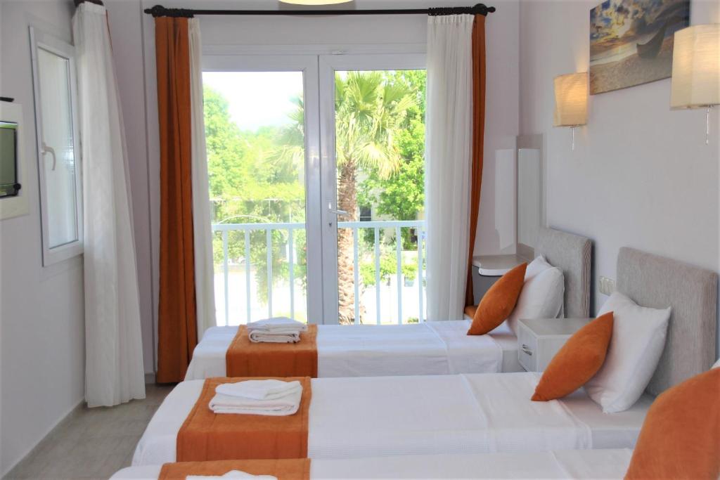 Postel nebo postele na pokoji v ubytování Dalyan Villa Amazon