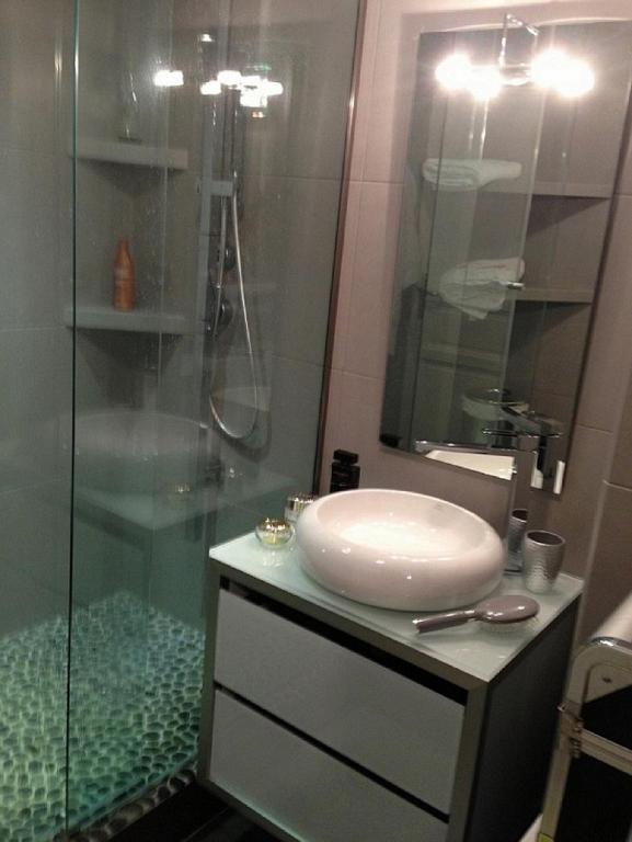 Koupelna v ubytování L'Appartement