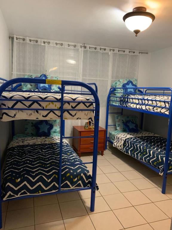 Postel nebo postele na pokoji v ubytování Los Pinos House