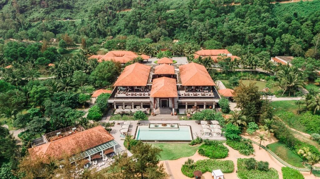 an aerial view of a house with a swimming pool at Banyan Tree Lang Co in Lang Co