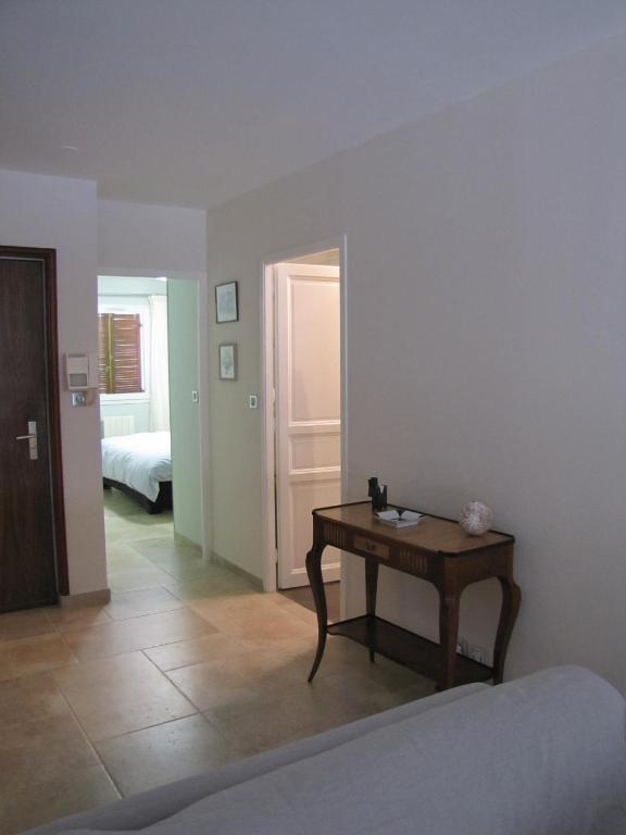 Postel nebo postele na pokoji v ubytování L'Appartement