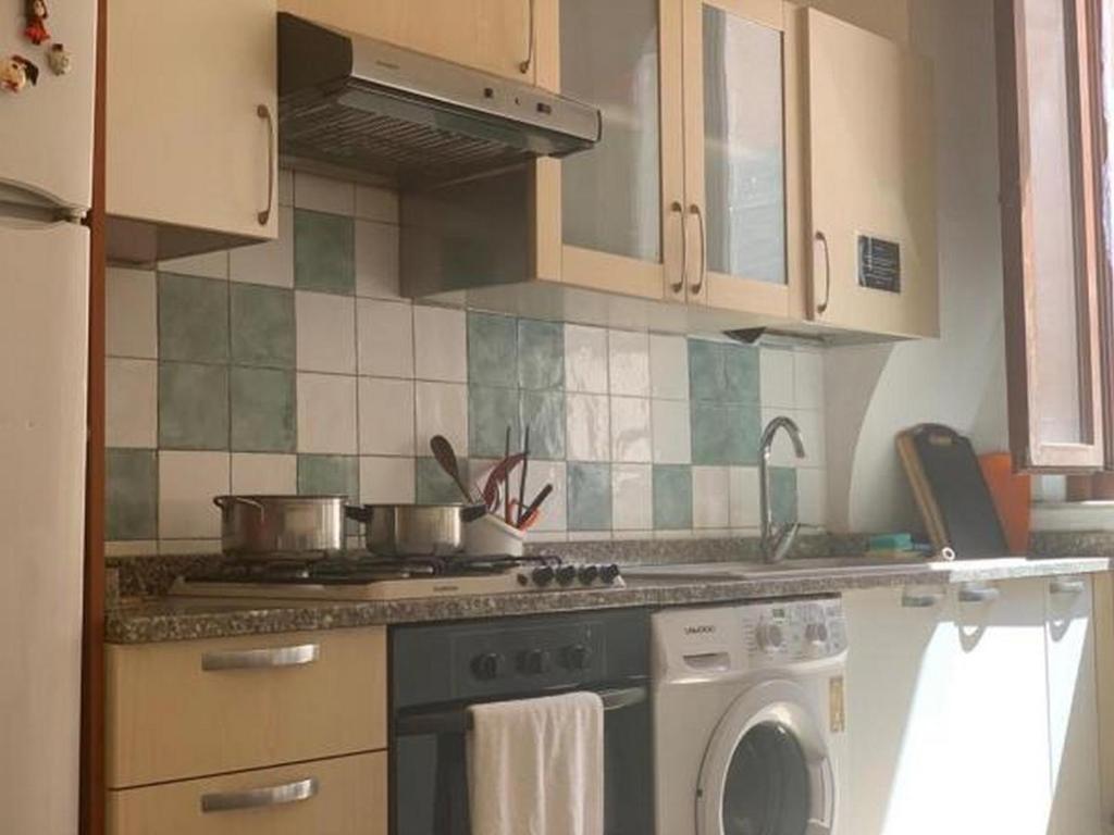 Kuchyň nebo kuchyňský kout v ubytování HostelCiompi