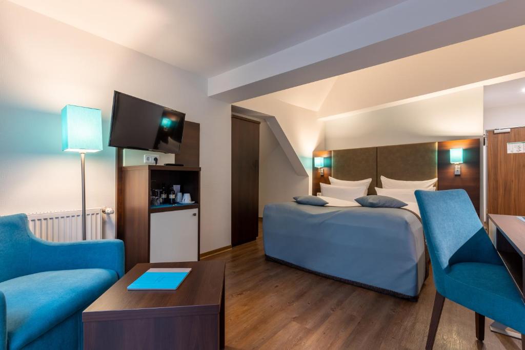 Cama ou camas em um quarto em Trip Inn Hotel Messe Westend