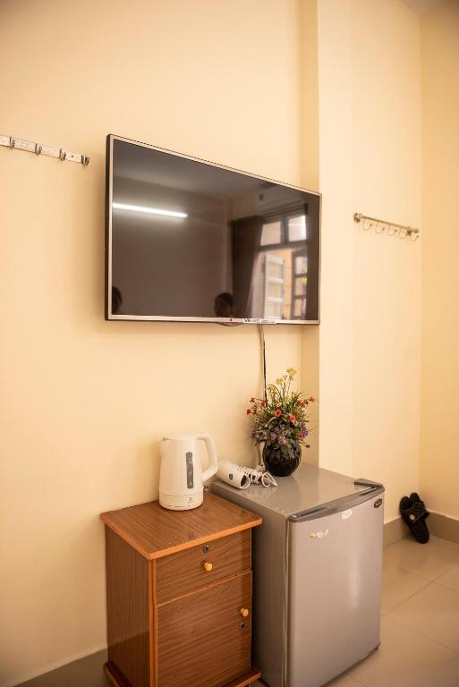 TV a/nebo společenská místnost v ubytování Minh Tam Guesthouse