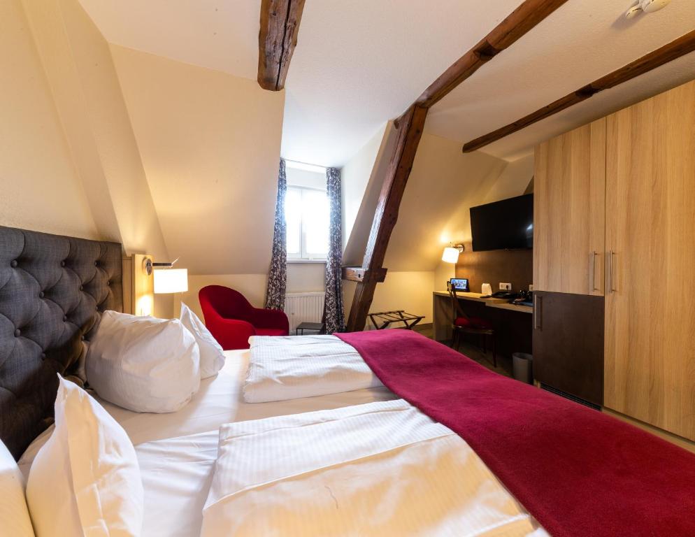 Postel nebo postele na pokoji v ubytování Best Western Hotel Schlossmühle Quedlinburg