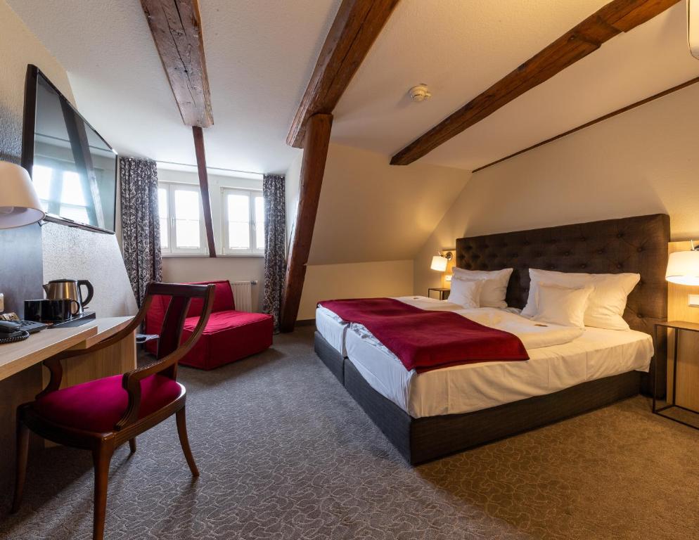 Postel nebo postele na pokoji v ubytování Best Western Hotel Schlossmühle Quedlinburg