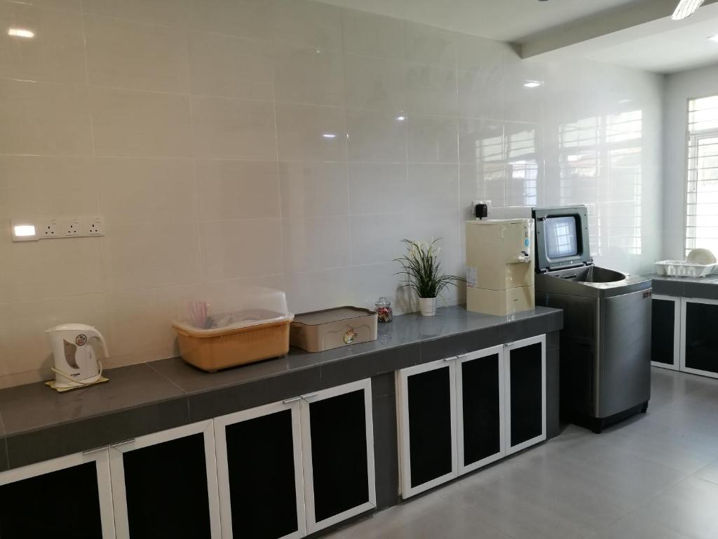 Kuchyň nebo kuchyňský kout v ubytování EJ Guesthouse