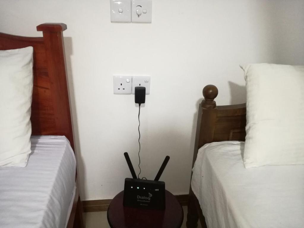 Postel nebo postele na pokoji v ubytování Ella Sunrise