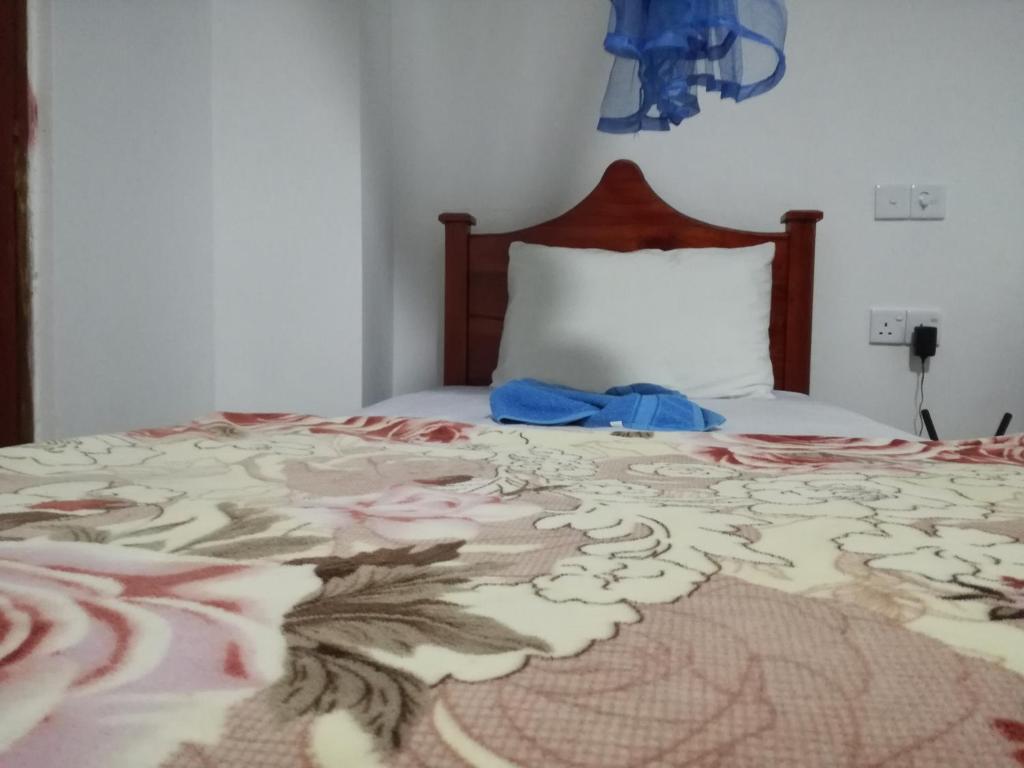 Postel nebo postele na pokoji v ubytování Ella Sunrise