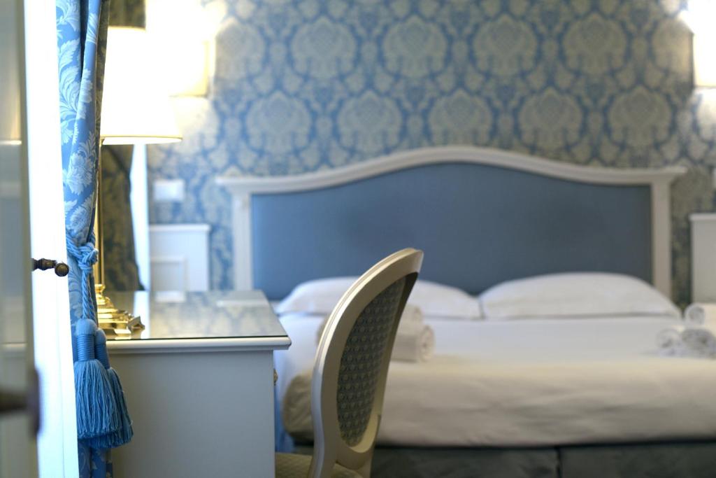 Cama o camas de una habitación en Corte Barozzi Venice Suites