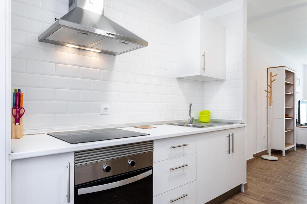 Kuchyň nebo kuchyňský kout v ubytování Home2Book Las Américas Apartment Terrace