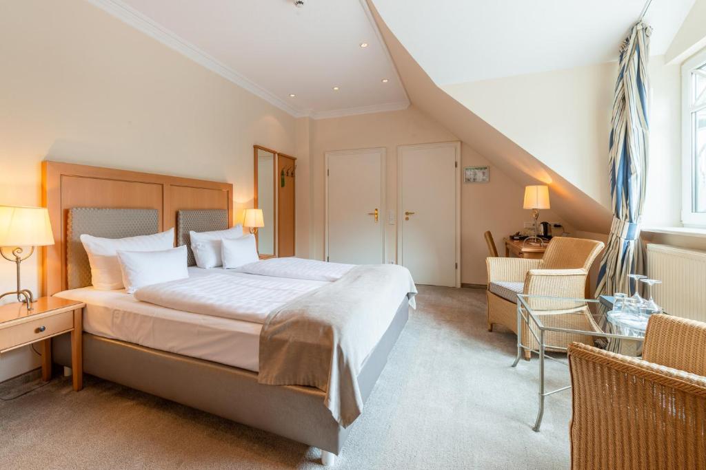 Postel nebo postele na pokoji v ubytování Thomas Hotel Spa & Lifestyle