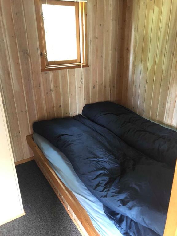 Postel nebo postele na pokoji v ubytování Rejkjær Camping Hytter & Lejligheder