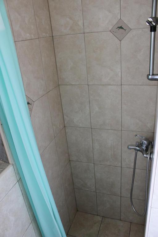 Koupelna v ubytování Rooms Marana