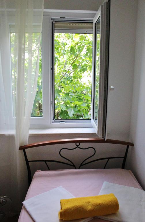 Postel nebo postele na pokoji v ubytování Rooms Marana