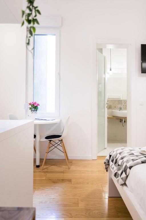 Łóżko lub łóżka w pokoju w obiekcie Studio Apartments near park Zrinjevac