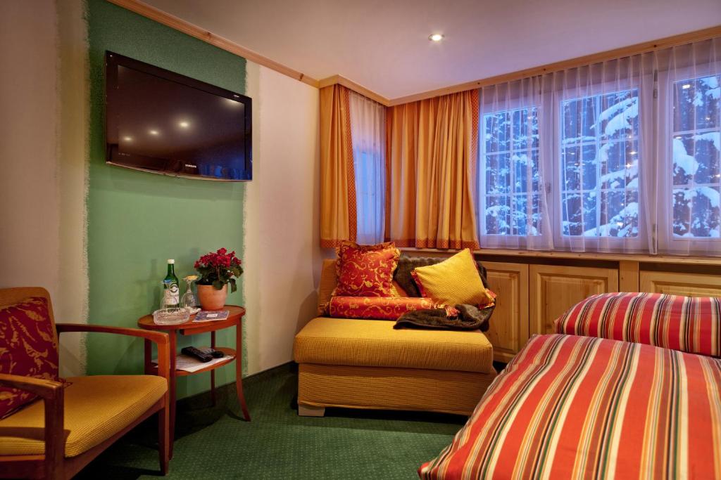 Postel nebo postele na pokoji v ubytování Hotel Arlenwald